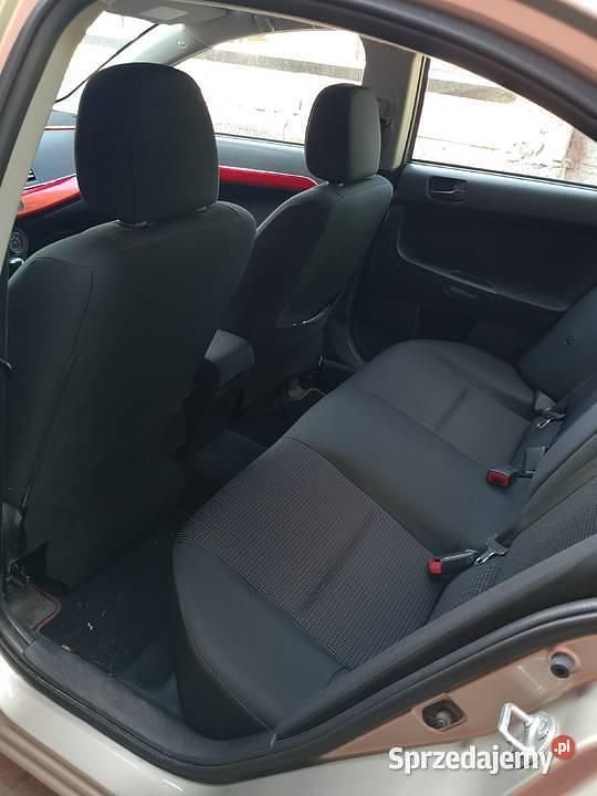 Używany Mitsubishi Lancer 109 KM (80 kW) 2010 Zielony Sedan/Limuzyna