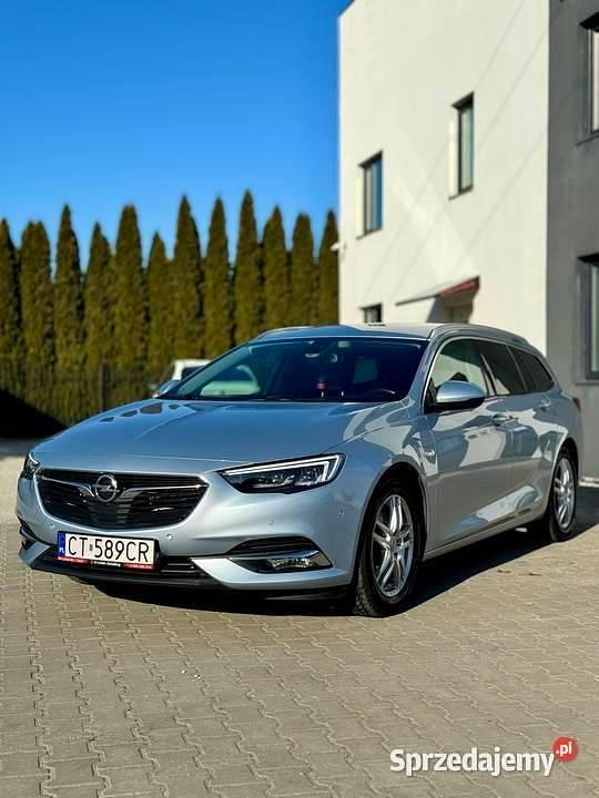 Niebieski Używany 2017 Opel Insignia Kombi | 59 040 zł (Uczciwa cena) - Obraz 1/4