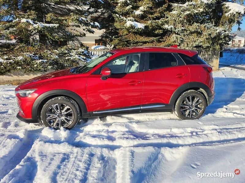 Używany Mazda CX-3 105 KM (77 kW) 2015 Bordowy SUV