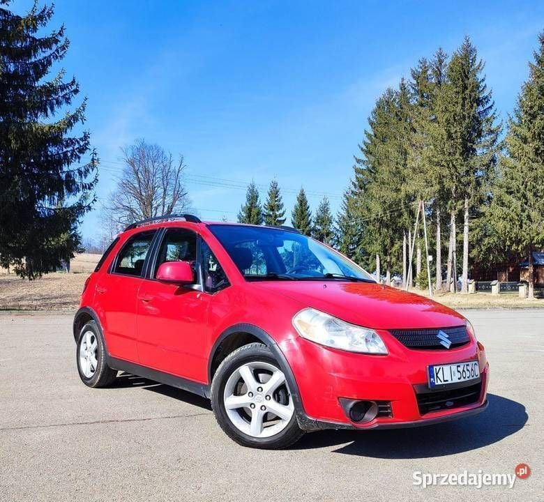 Czerwony Używany 2007 Suzuki SX4 SUV | 18 900 zł - Obraz 1/4
