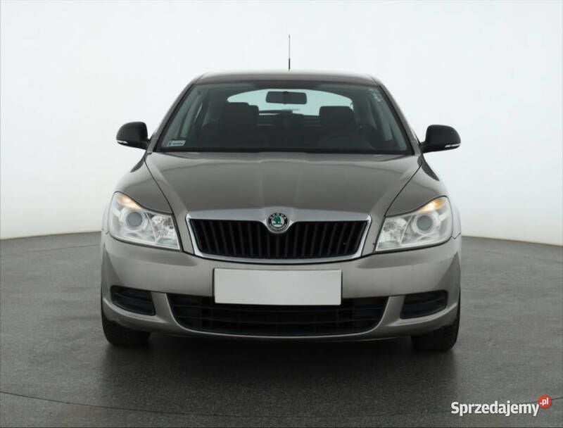 Beżowy Używany 2011 Skoda Octavia Hatchback | 20 999 zł (Uczciwa cena) - Obraz 1/4