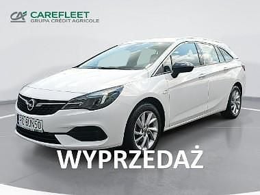 Biały Używany 2022 Opel Astra Elegance Kombi | 47 900 zł (Uczciwa cena) - Obraz 1/4