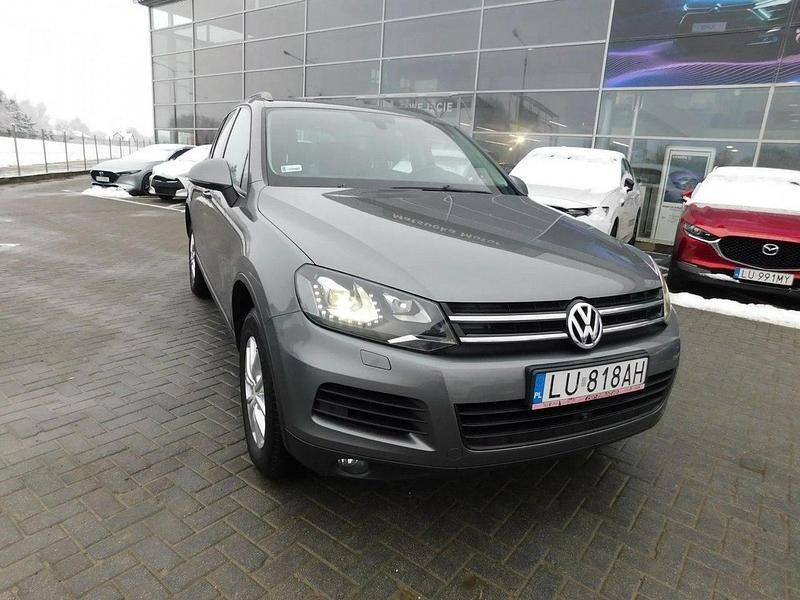 Szary (metalik) Używany 2012 VW Touareg SUV | 77 900 zł (Dobra cena) - Obraz 1/4