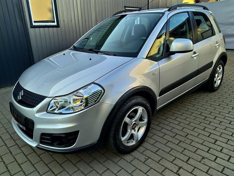 Używany Suzuki SX4 120 KM (88 kW) 2011 Srebrny (metalik) Minivan