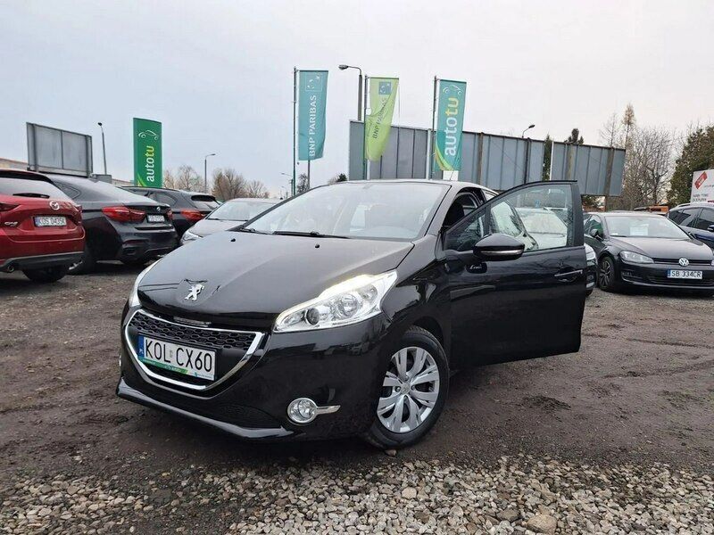 Czarny Używany 2013 Peugeot 208 Hatchback | 26 900 zł (Dość drogi) - Obraz 1/4
