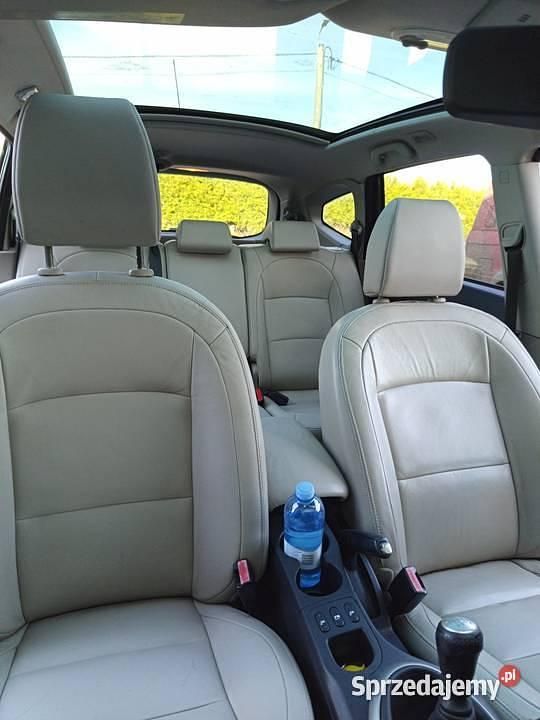 Używany Nissan Qashqai +2 130 KM (95 kW) 2012 Czarny SUV