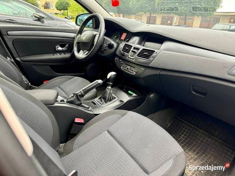 Używany Renault Laguna III 110 KM (80 kW) 2007 Czerwony Hatchback