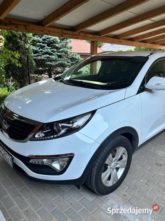 Biały Używany 2012 Kia Sportage SUV | 40 500 zł (Drogi) - Obraz 1/4