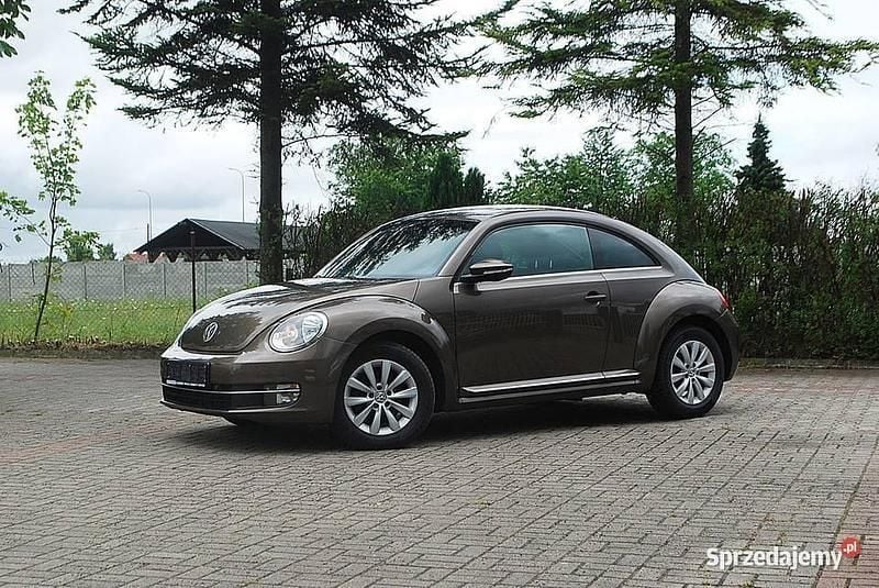 Brązowy (metalik) Używany 2012 VW Beetle Hatchback | 33 900 zł (Uczciwa cena) - Obraz 1/4