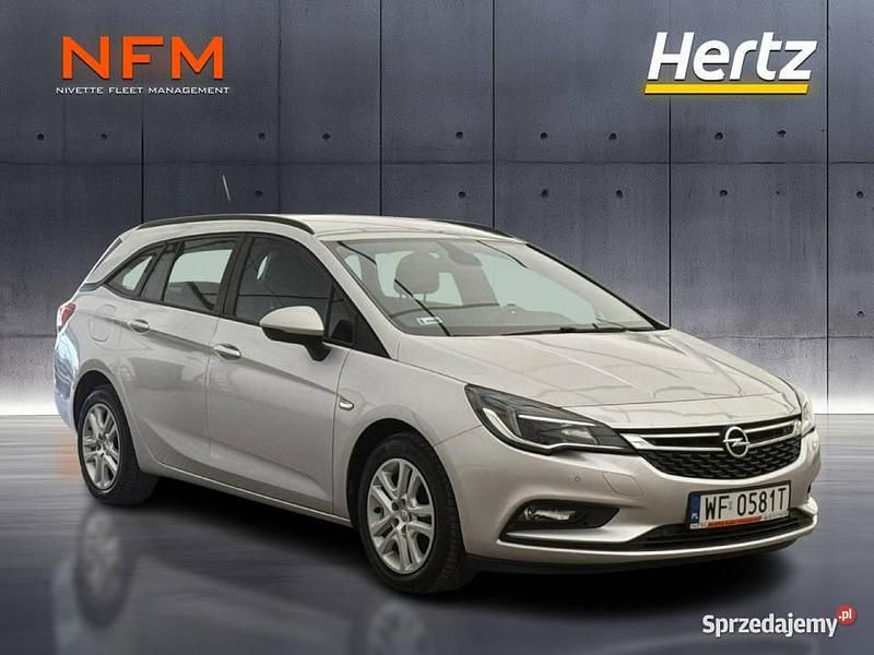 Srebrny (metalik) Używany 2018 Opel Astra Enjoy Kombi | 35 900 zł (Uczciwa cena) - Obraz 1/3