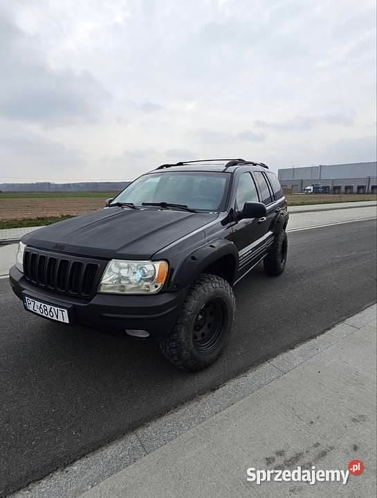 Czarny Używany 2001 Jeep Grand Cherokee SUV | 19 000 zł (Dobra cena) - Obraz 1/4