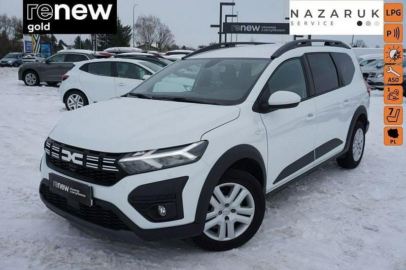 Biały Używany 2024 Dacia Jogger Expression Minivan | 66 900 zł (Uczciwa cena) - Obraz 1/4