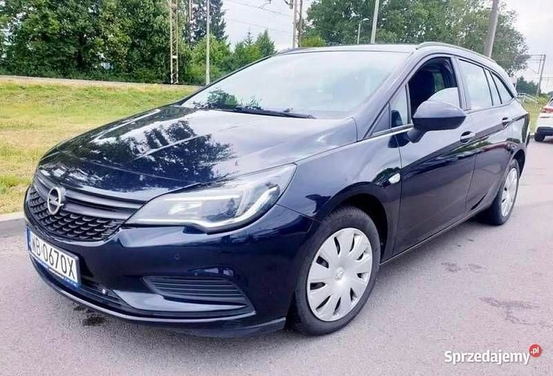 Granatowy Używany 2018 Opel Astra Kombi | 26 900 zł (Uczciwa cena) - Obraz 1/4
