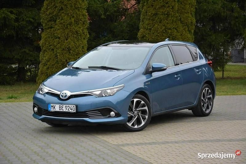 Niebieski jasny (metalik) Używany 2016 Toyota Auris Hybrid Premium Sedan/Limuzyna | 59 900 zł (Drogi) - Obraz 1/4