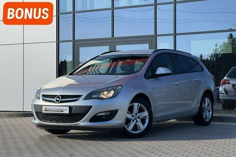 Srebrny Używany 2015 Opel Astra Kombi | 35 299 zł (Dość drogi) - Obraz 1/4
