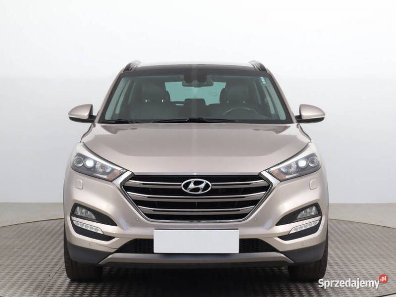 Beżowy Używany 2015 Hyundai Tucson SUV | 67 999 zł (Uczciwa cena) - Obraz 1/4