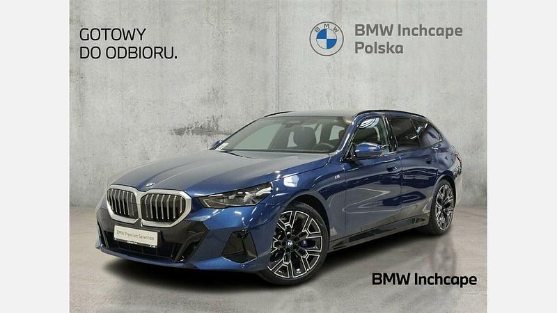 Niebieski phytonic metalizowany Używany 2024 BMW 520 Comfort Edition Kombi | 244 900 zł (Uczciwa cena) - Obraz 1/3