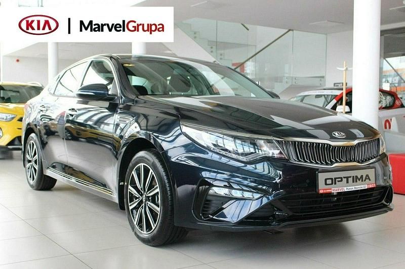 Niebieski ciemny Używany 2018 Kia Optima Coupe | 119 900 zł - Obraz 1/1