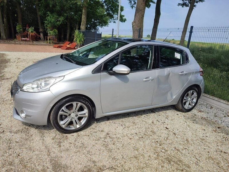 Srebrny Używany 2012 Peugeot 208 Hatchback | 12 999 zł - Obraz 1/4