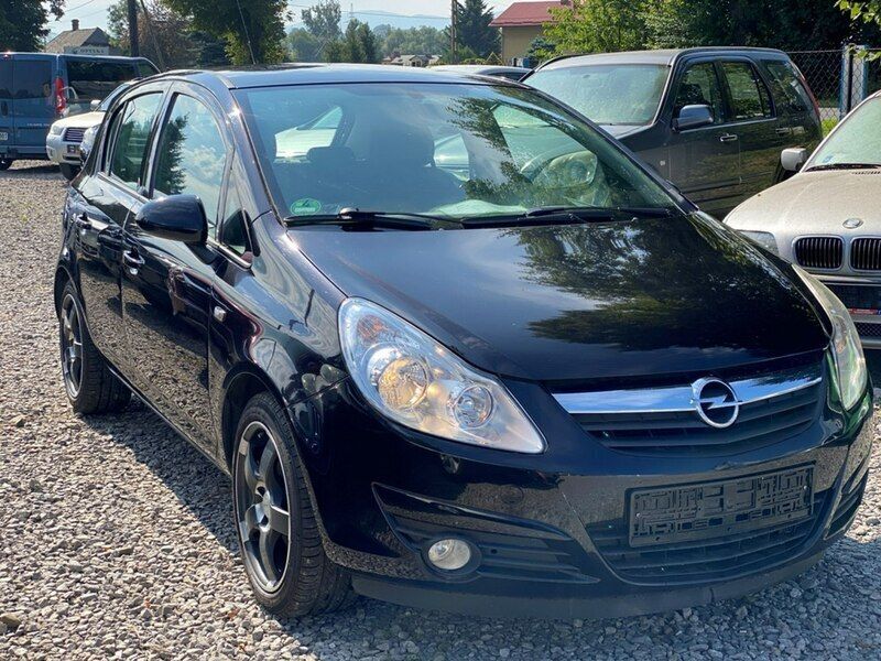 Używany Opel Corsa 86 KM (63 kW) 2010 Czarny Hatchback