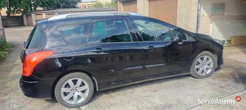 Używany Peugeot 308 SW 2011 Czarny Kombi