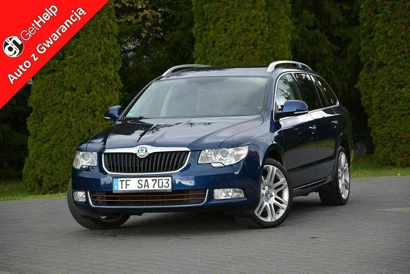 Czerwony Używany 2011 Skoda Superb Kombi | 26 900 zł (Uczciwa cena) - Obraz 1/4
