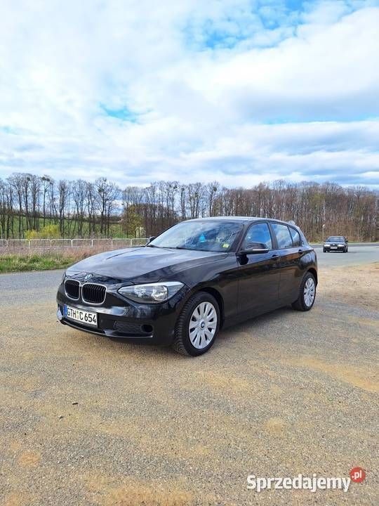 Czarny Używany 2012 BMW 116 Hatchback | 25 600 zł (Uczciwa cena) - Obraz 1/4