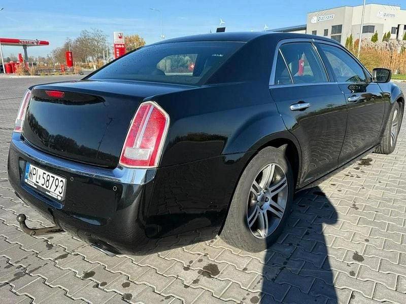 Używany Lancia Thema 239 KM (175 kW) 2013 Czarny Sedan/Limuzyna