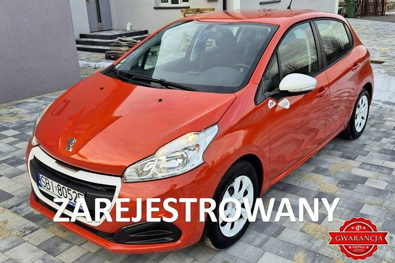 Pomarańczowy (metalik, perła) Używany 2015 Peugeot 208 Hatchback | 18 600 zł (Dobra cena) - Obraz 1/4