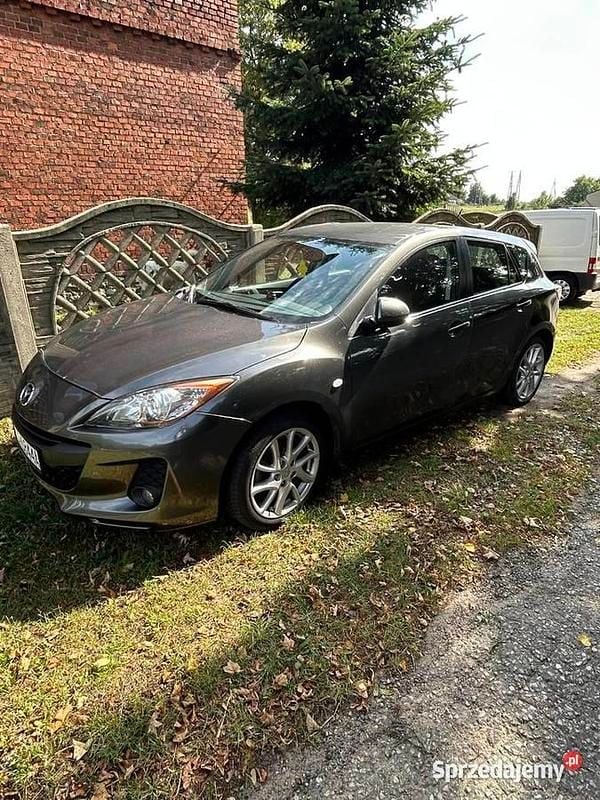 Używany Mazda 3 105 KM (77 kW) 2012 Brązowy Hatchback