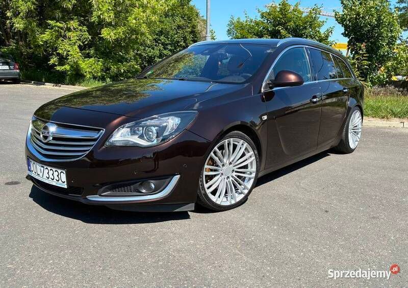 Brązowy Używany 2015 Opel Insignia Cosmo Kombi | 34 000 zł (Dość drogi) - Obraz 1/4
