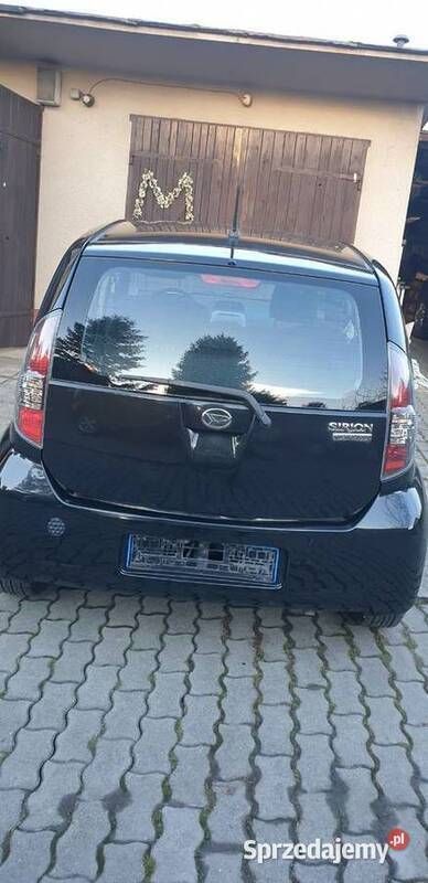 Czarny Używany 2009 Daihatsu Sirion Hatchback | 11 200 zł (Dobra cena) - Obraz 1/4