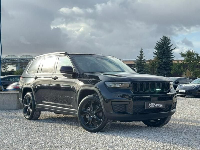Czarny (metalik) Używany 2023 Jeep Grand Cherokee Altitude SUV | 209 900 zł - Obraz 1/4