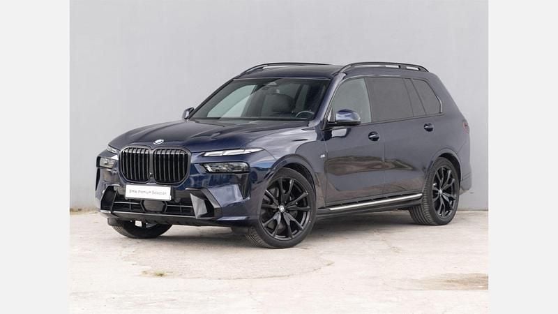 Niebieski tanzanite bmw individual metalizowany Używany 2022 BMW X7 Comfort Edition SUV | 399 900 zł (Uczciwa cena) - Obraz 1/3