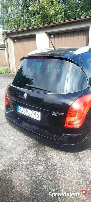 Używany Peugeot 308 SW 2011 Czarny Kombi