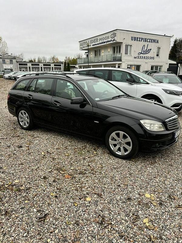 Używany Mercedes C200 136 KM (100 kW) 2010 Czarny Kombi