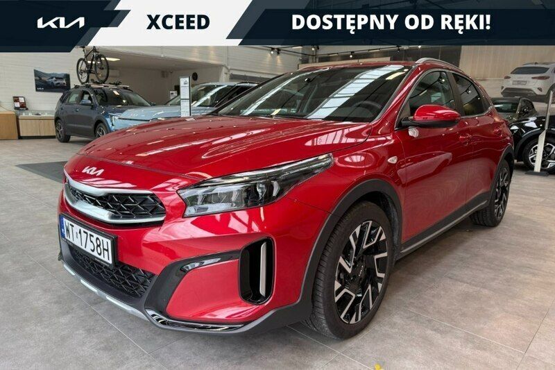Czerwony (metalik) Używany 2024 Kia XCeed 2 SUV | 104 900 zł (Uczciwa cena) - Obraz 1/4