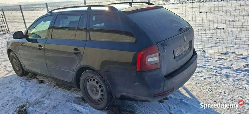 Czarny Używany 2009 Skoda Octavia Kombi | 12 600 zł (Uczciwa cena) - Obraz 1/2