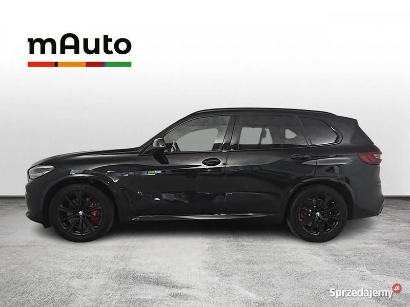 Czarny (metalik) Używany 2021 BMW X5 M50 Comfort Edition SUV | 299 900 zł - Obraz 1/4