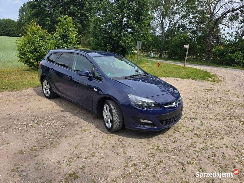 Granatowy Używany 2016 Opel Astra Kombi | 33 000 zł - Obraz 1/4