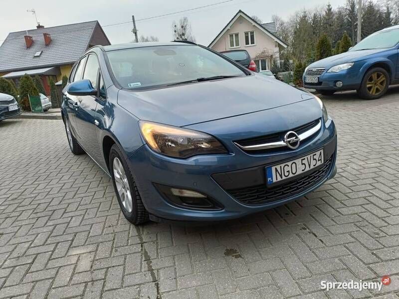 Niebieski Używany 2014 Opel Astra Kombi | 19 500 zł (Uczciwa cena) - Obraz 1/4