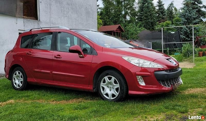 Używany Peugeot 308 SW 2008 Czerwony Kombi