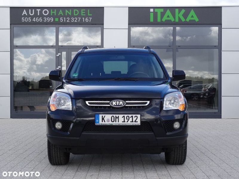 Kia sportage ii рестайлинг