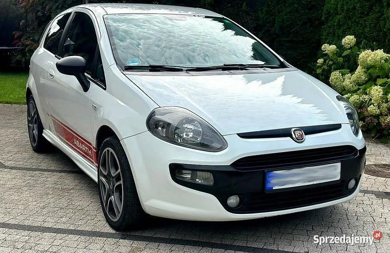 Biały Używany 2011 Fiat Grande Punto Abarth Hatchback | 14 900 zł - Obraz 1/4