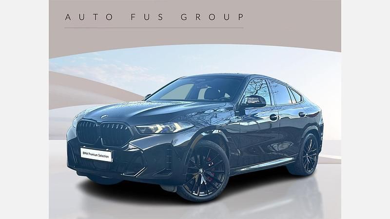 Czarny szafir metalizowany Używany 2024 BMW X6 Comfort Edition SUV | 419 900 zł - Obraz 1/3