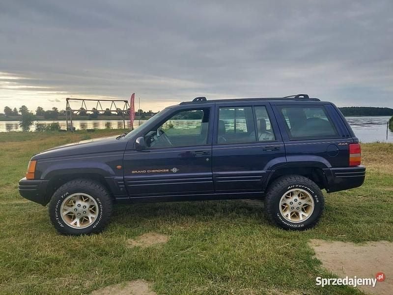 Fioletowy Używany 1998 Jeep Grand Cherokee SUV | 37 600 zł - Obraz 1/4
