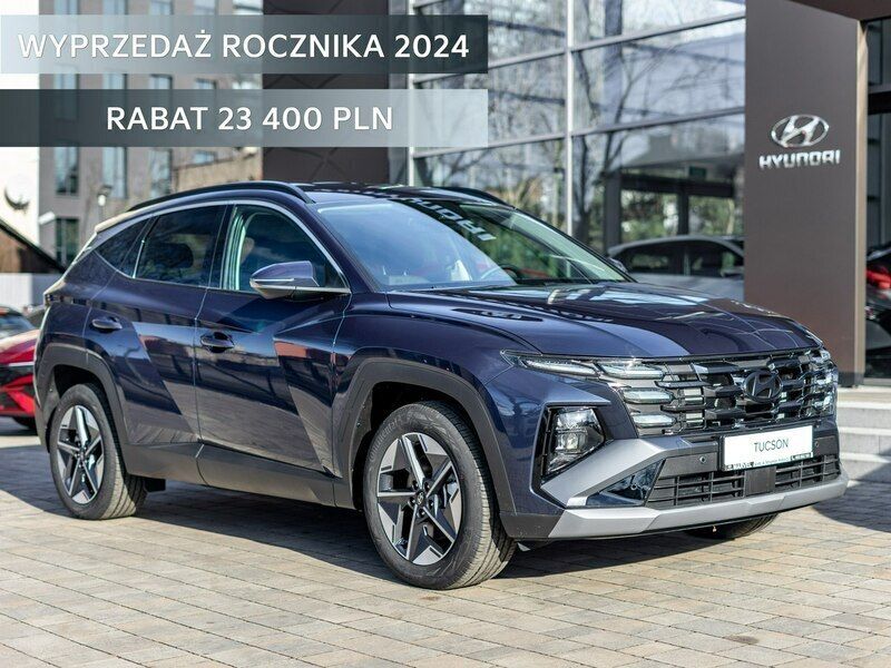 Niebieski ciemny (metalik) Używany 2024 Hyundai Tucson SUV | 156 600 zł - Obraz 1/4