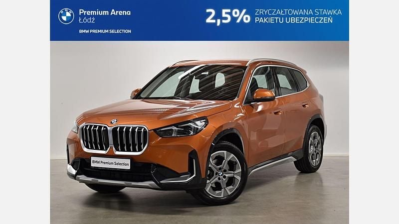 Pomarańczowy utah metalizowany Używany 2025 BMW X1 Luxury Line SUV | 184 900 zł (Uczciwa cena) - Obraz 1/3