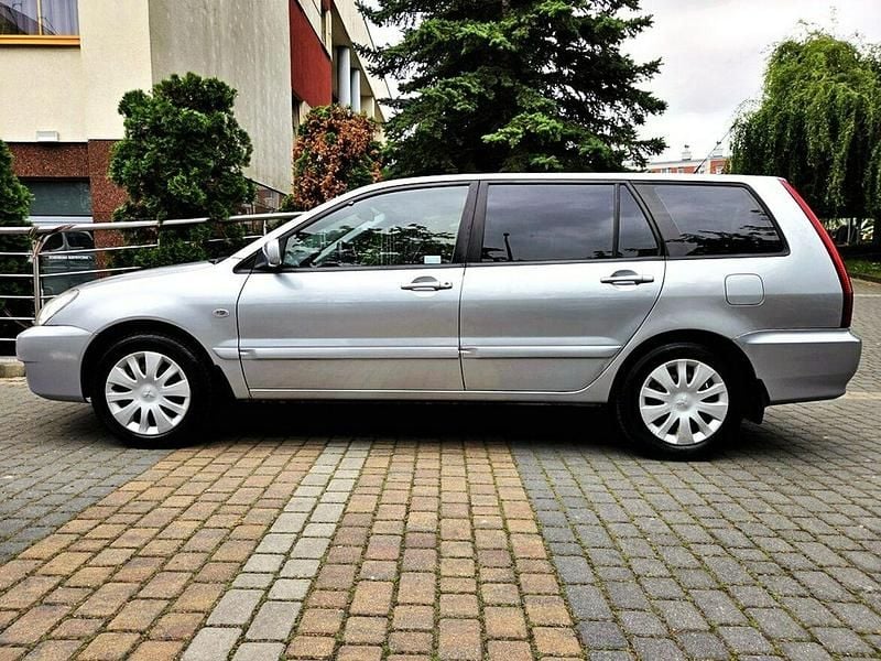 Używany Mitsubishi Lancer 98 KM (72 kW) 2006 Srebrny (metalik) Kombi