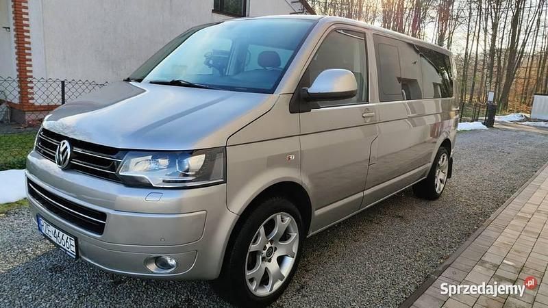 Złoty Używany 2012 VW Caravelle Minivan | 69 900 zł (Uczciwa cena) - Obraz 1/4